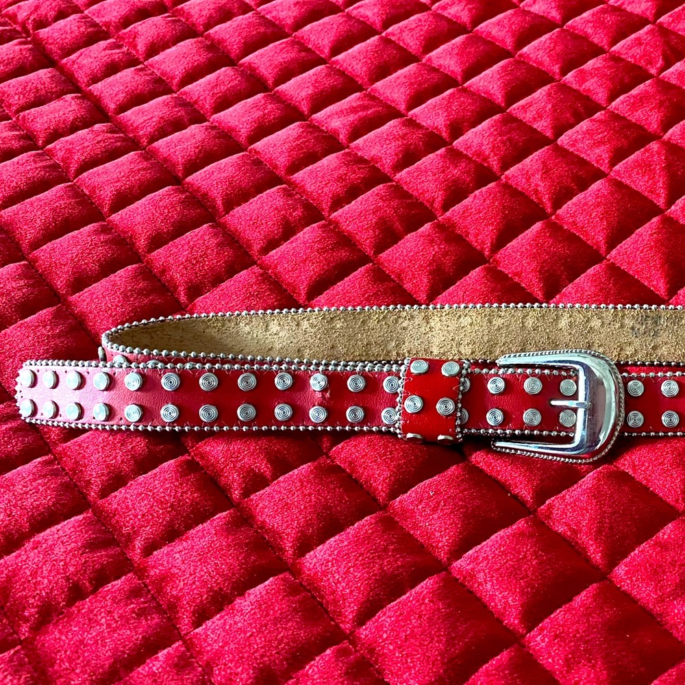 Red studded leather belt